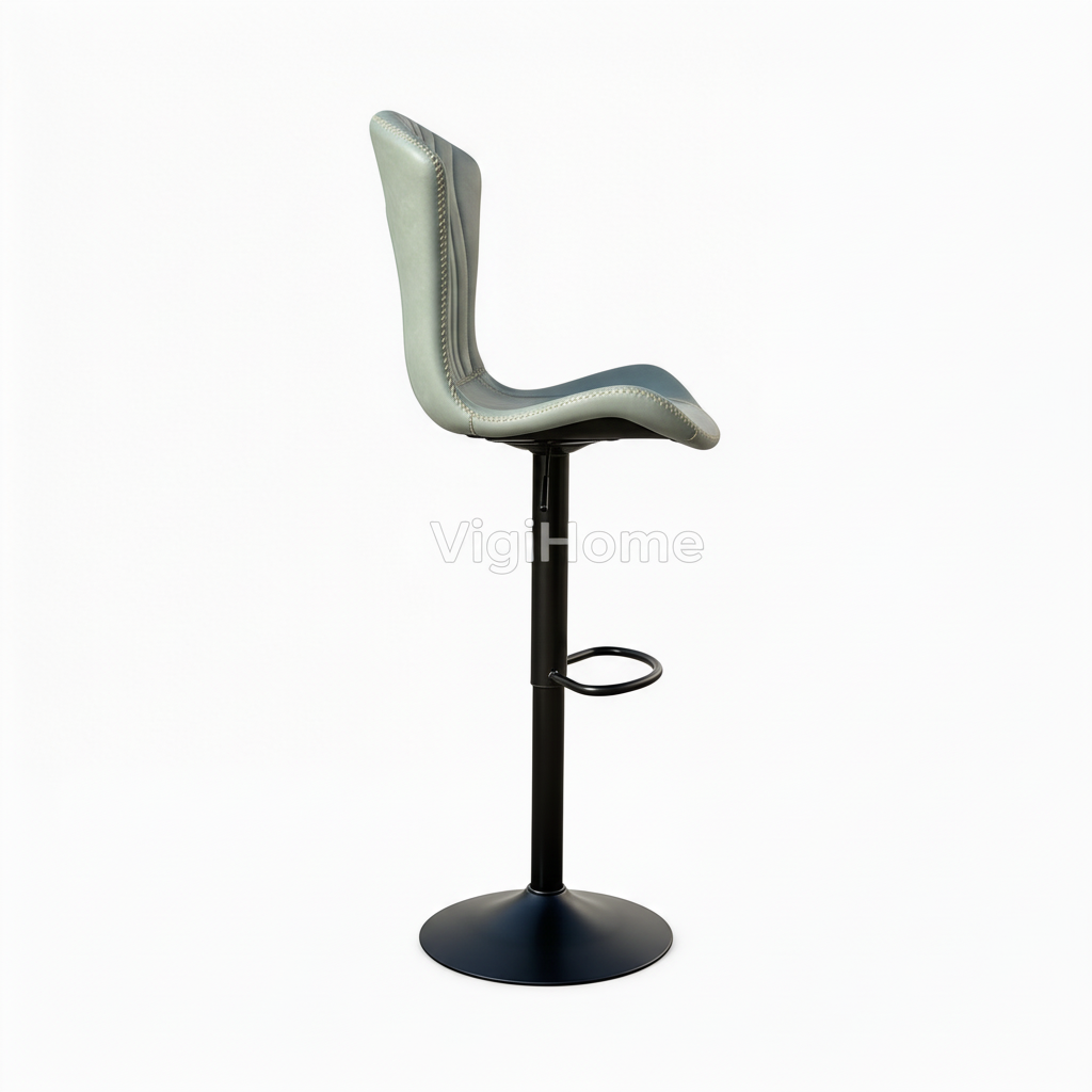 Tabouret de bar Monark vert sauge vue de profil, pied métal noir avec repose-pied